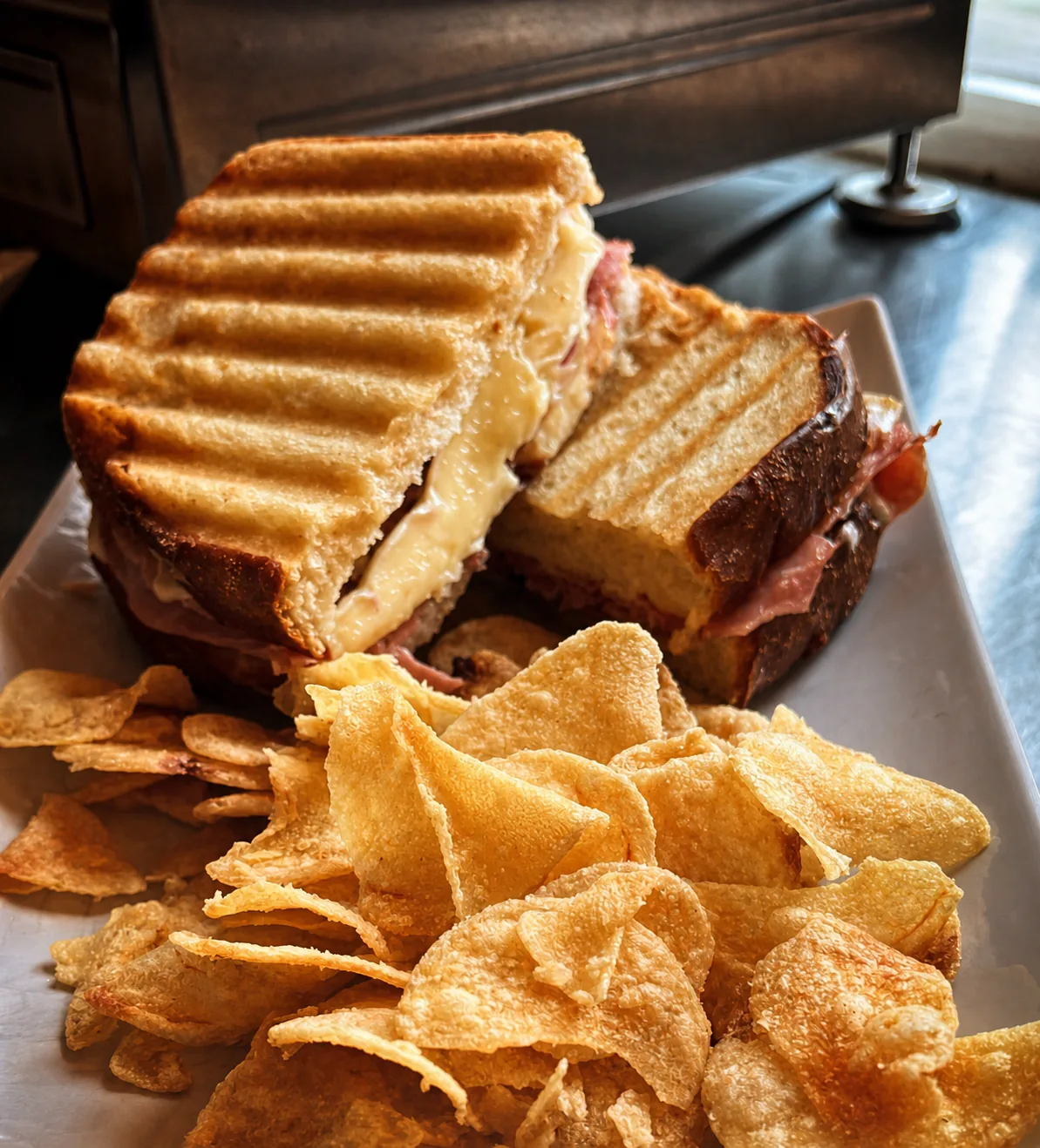 Toasted sandwich and crisps at Gatehouse Coffee